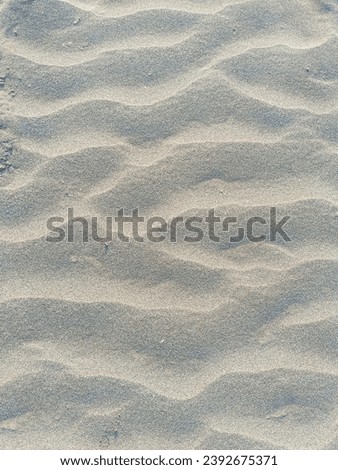 White rippled beach sand close up