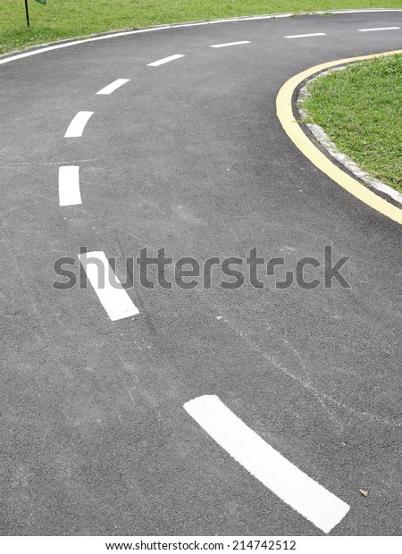White road markings on
asphalt