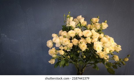 White Roses Bouquet On Dark Background.