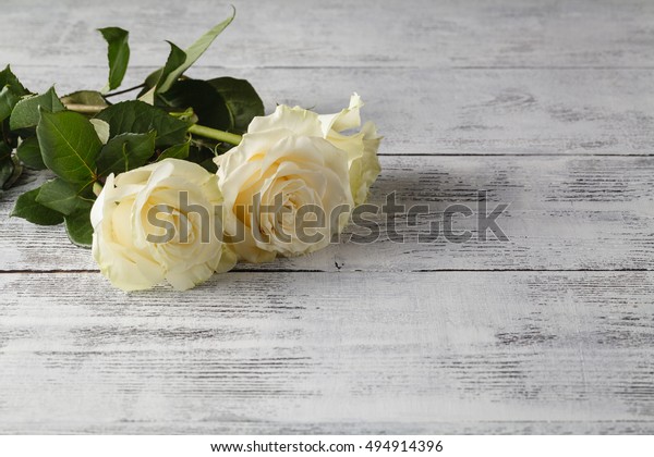 White Roses On Wooden Table Stock Photo 494914396 | Shutterstock