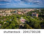 White rotunda or Rotunda of friendship among peoples in Poltava city, Ukrainian landmark. Aerial view with cityscape