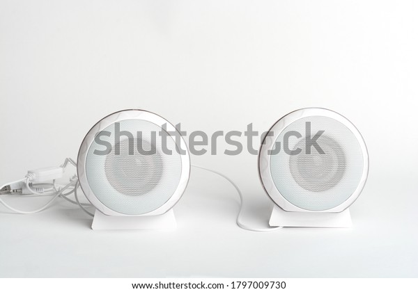 white round audio speakers for computer on a\
white background