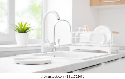 White round tray for products display on kitchen sink background - Shutterstock ID 2311722091