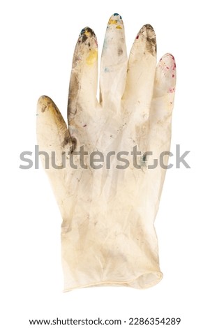 White rubber gloves in spots of paint on white background. The concept of creativity, creation. File contains clipping path.