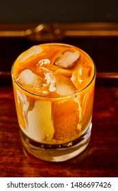 White Russian Cocktail, Isolated On A Serving Tray, The Image Is Shot From Slightly Overhead.