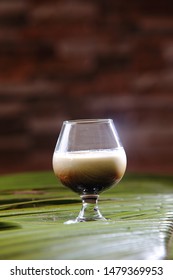 A White Russian is a cocktail made with vodka, coffee liqueur and cream served with ice in an Old Fashioned glass. Often milk or half and half will be used as an alternative to cream.
