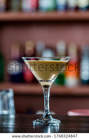 White Russian cocktail with mixed vodka, coffee liqueur, heavy cream