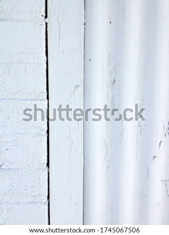 White rustic abstract design background chipped paint flaking corrogated metal sheet