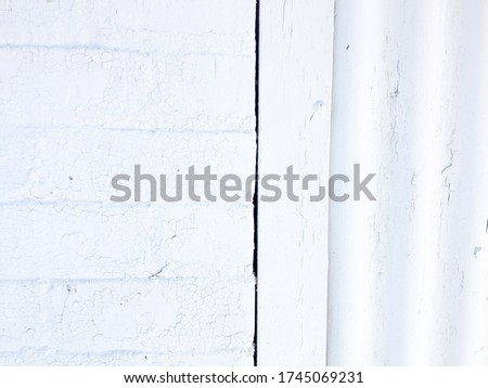 White rustic abstract design background chipped paint flaking corrogated metal sheet