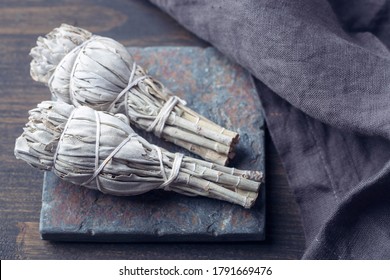 White Sage Smudge Stick On Grey Background