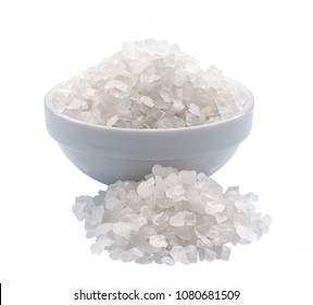 white salt crystals in a ceramic bowl isolated