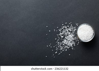 White Salt On Black Background