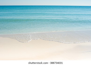 White Sand Beach With Blue Green Waves