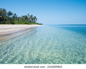 White Sand Beach With Coconut Palm Trees Turquoise Blue Water Coral Reef, Tropical Travel Destination, Desert Beach No People - Banyak Islands, Sumatra, Indonesia