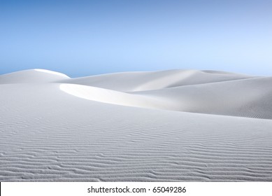 White Sand Dune And Blue Sky