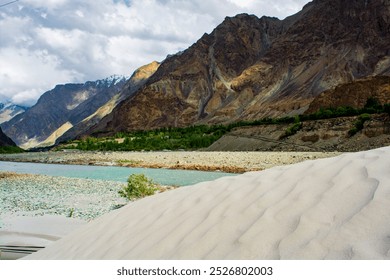 White sand dune and river in the Himalayan mountains range near the Kargil border  - Powered by Shutterstock