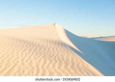 White sand dunes against blue cloudless sky, Jurien Bay, Western Australia