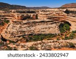 The white sandstone landscape surrounding Kachina Bridge, White Canyon, Natural Bridges National Monument, Utah, Southwest USA.