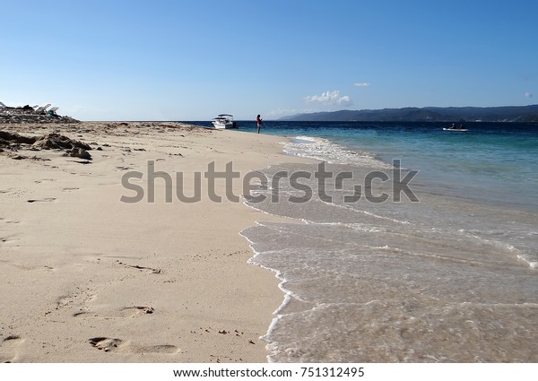 White Sandy Beach Under Blue Sky Stock Photo Edit Now