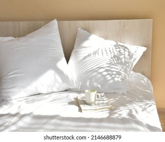 White satin bedding set for hotels - Shutterstock ID 2146688879