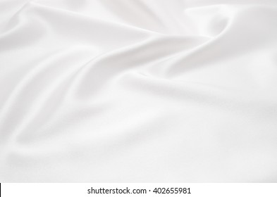 white satin fabric as background - Shutterstock ID 402655981