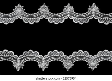 White Scalloped Lace Over Black Background.  A Lovely Delicate Border.