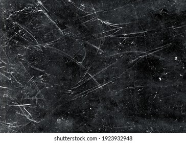 White Scratches And Dust On Black Background. Vintage Scratched Grunge Plastic Broken Screen Texture. Scratched Glass Surface Wallpaper. Space For Text