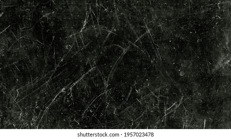 White Scratches And Dust On Black Background. Vintage Scratched Grunge Plastic Broken Screen Texture. Scratched Glass Surface Wallpaper. Dirty Blackboard. Space For Text.