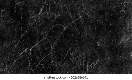 White scratches and dust on black background. Vintage scratched grunge plastic broken screen texture. Scratched glass surface wallpaper. Space for text.