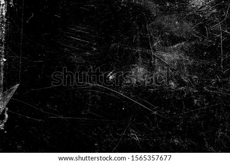 white scratches with spots isolated on a black background
