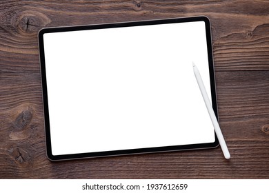 White screen mockup of tablet computer. Wireless stylus pen for drawing or writing on the screen.