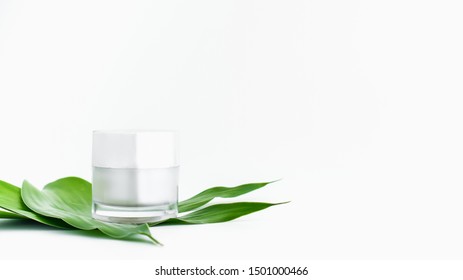 White Serum Bottle And Cream Jar, Mockup Of Beauty Product Brand. Top View On The White Background.