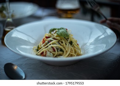 A white serving plate with homemade seafood spaghetti - Shutterstock ID 1795179553