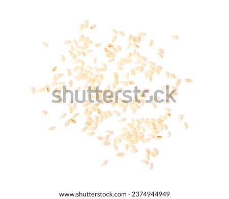 White sesame seeds isolated on white background. top view