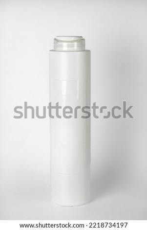 White shampoo bottle, 3d vector on a light gray background. Template for advertising, hygiene, hair and cosmetic products.