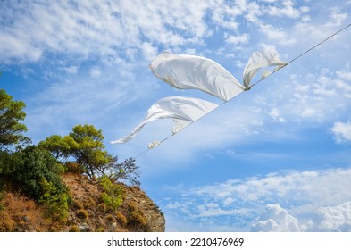 White Sheet Fabric Fluttering In The Wind