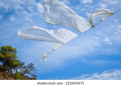 White Sheet Fabric Fluttering In The Wind