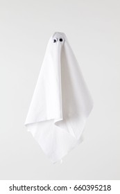 White Sheet Ghost Isolated On A White Background. Tones On Tones Photography