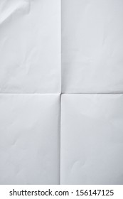 White Sheet Of Paper Folded In Four