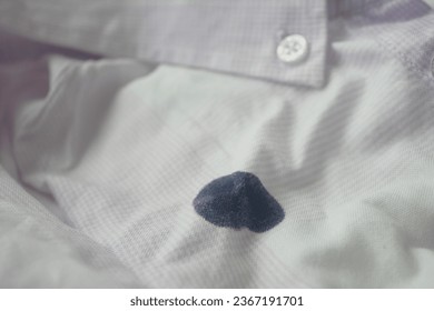  white shirt with blue ink stain . - Shutterstock ID 2367191701