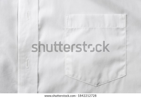 White shirt chest pocket\
close up