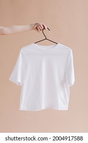 White Shirt In A Hanger Mockup