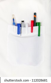 White Shirt Pocket With Colored Pens
