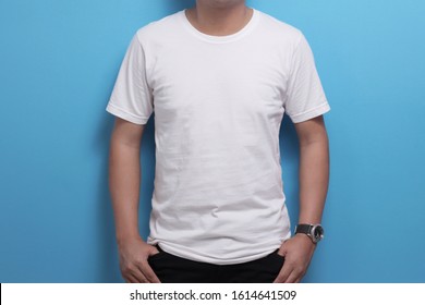 White Shirt Template, Asian Male Model Wearing T-shirt With Copy Space Against Blue Background, Front Design