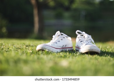White shoes on grass in a park in China.