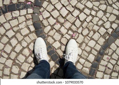 White Shoes On Sidewalk Texture.