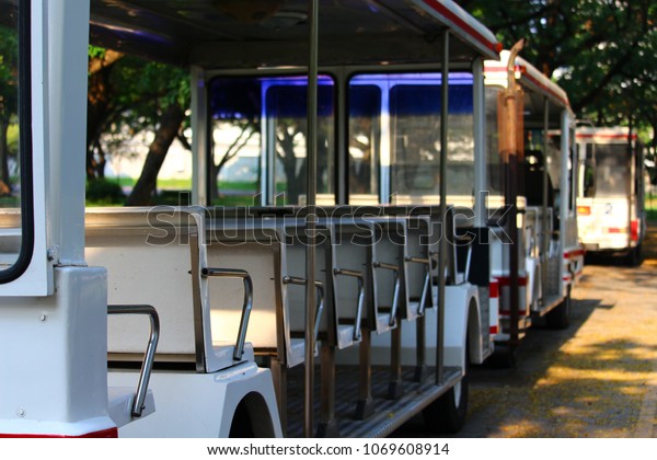 White shuttle bus on the\
street.