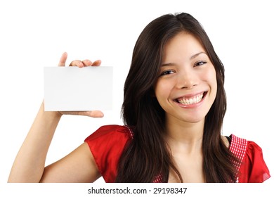 White sign or notecard. Smiling mixed caucasian / asian woman with a blank card. Isolated on white