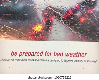 White Sign Saying Be Prepared For Bad Weather In Red Lettering