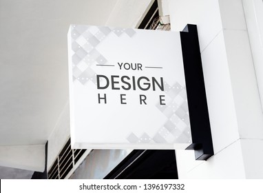 White signage mockup on a wall